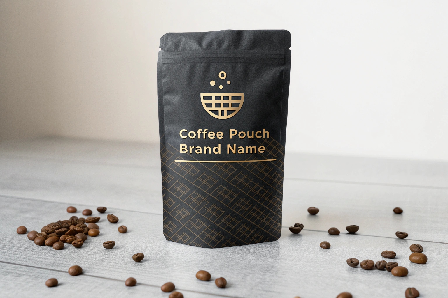 Matte black stand-up coffee pouch with gold print design, surrounded by scattered coffee beans.