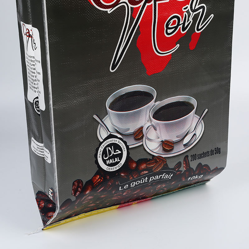 Café Noir coffee packaging with Africa map design, coffee beans, and two coffee cups.