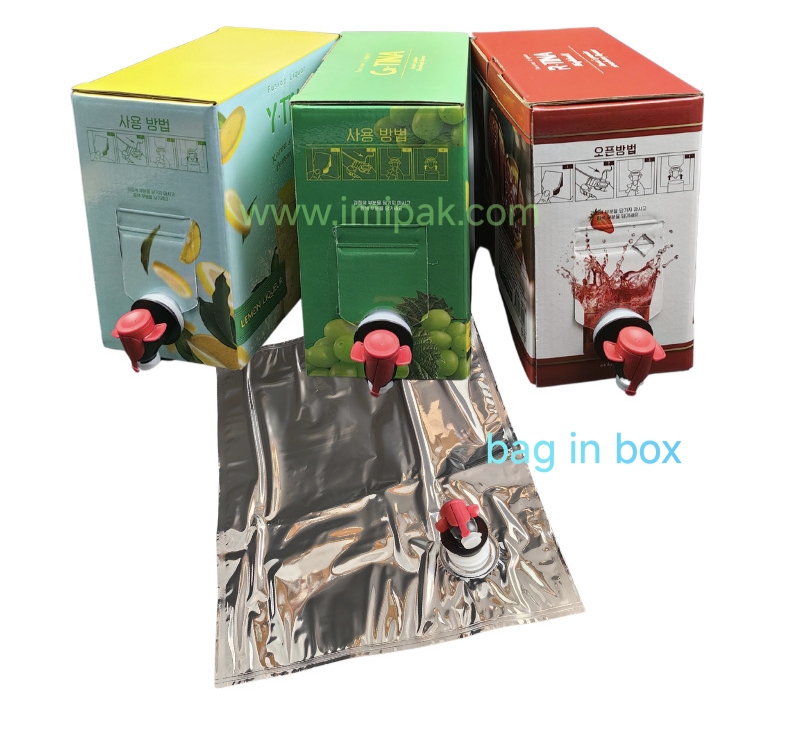 Colorful bag-in-box packaging with spouts, including silver inner bags and printed cartons for juice or liquid storage.