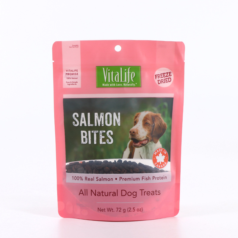 Pink stand-up pouch for Vitalife Salmon Bites dog treats, showing dog image and freeze-dried label.