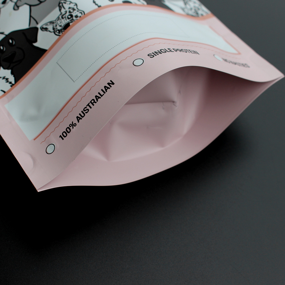 Close-up of pink dog food pouch bottom with gusset and 100% Australian label.