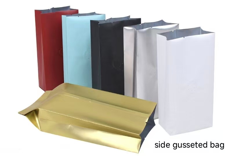 Assorted color side gusseted coffee bags including red, black, white, and gold.