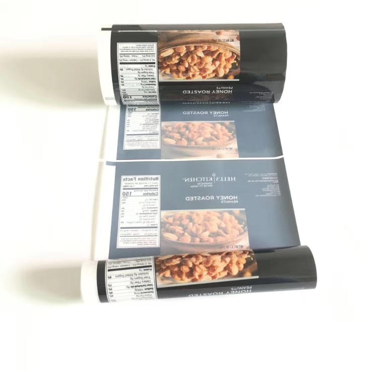 Printed laminated roll film for roasted peanut snack food packaging applications