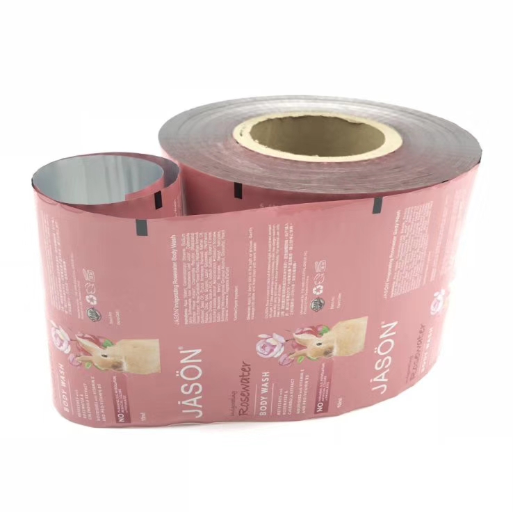Pink custom printed laminated roll film for personal care product packaging