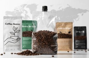 Assorted coffee packaging pouches central transparent bean bag world map