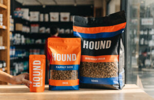 Custom printed pet food packaging bags displayed in multiple sizes